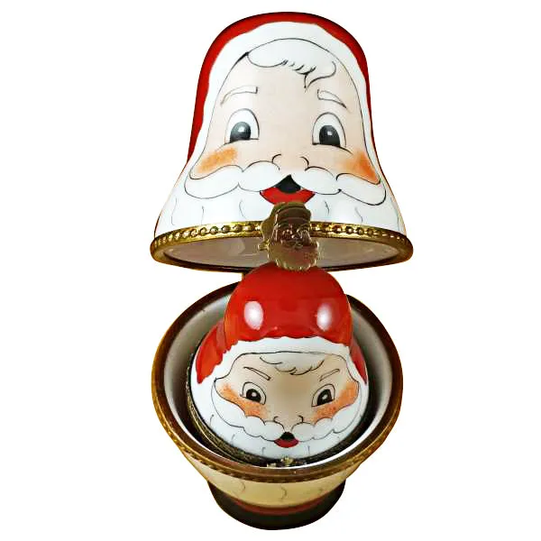 Four Nesting Santa Claus Limoges Box